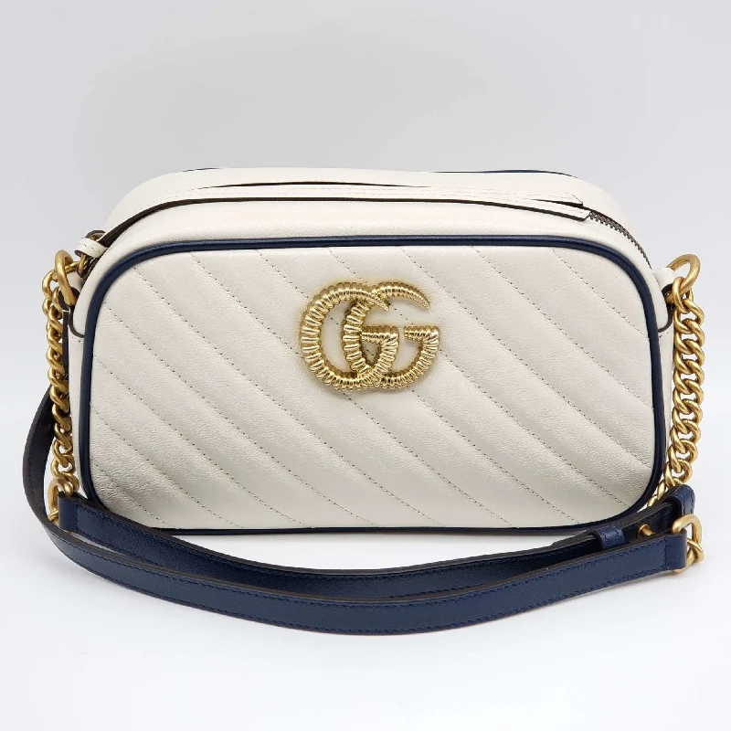 Women Gucci bags with a magnetic snap closure for easy accessWomen Gucci bags with a magnetic snap closure for easy accessGucci GG Marmont Shoulder Bag