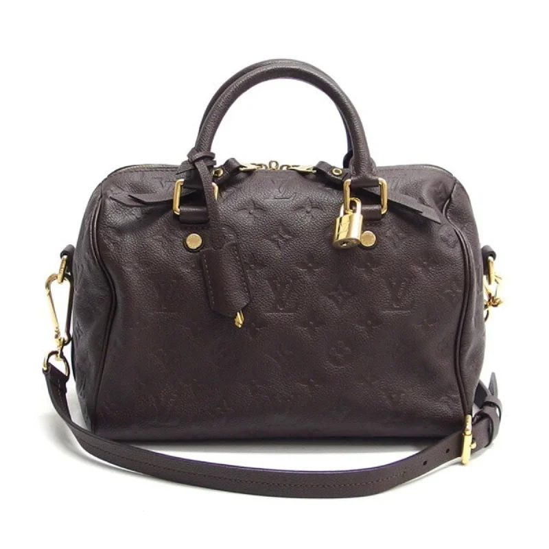 Louis Vuitton Twist bags with the iconic LV - turnlock closureLOUIS VUITTON Speedy Bandouliere Handbag