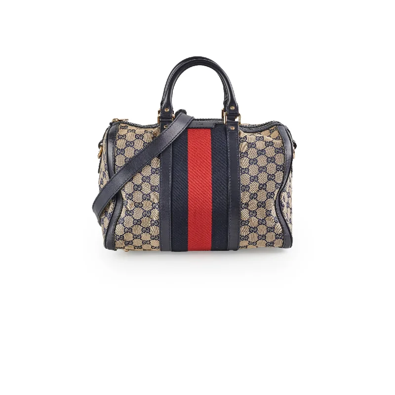 Ladies Gucci handbags with a detachable coin purse insideLadies Gucci handbags with a detachable coin purse insideGucci Boston GG Canvas Bag