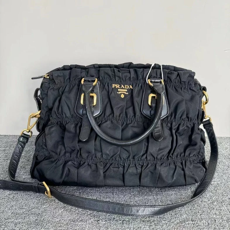 Prada Cleo bags with a snakeskin - effect panel for a bold and trendy lookPrada Black Nylon Tessuto Gaufre Tote Bag Medium