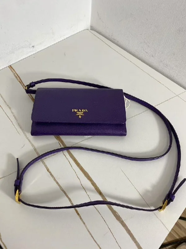 Prada tote bags with a water - resistant coating for outdoor activitiesPrada Purple Pebbled Calfskin Crossbody Bag