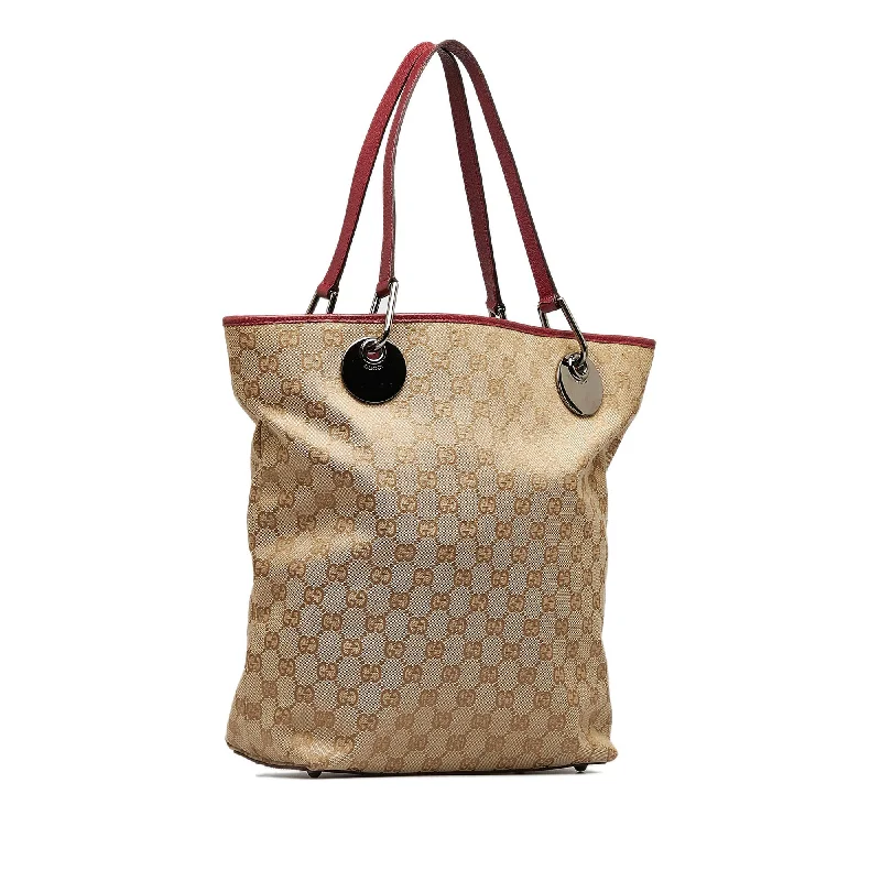 Women Gucci Sylvie bags with a detachable ribbon detailWomen Gucci Sylvie bags with a detachable ribbon detailTan Gucci GG Canvas Eclipse Tote Bag