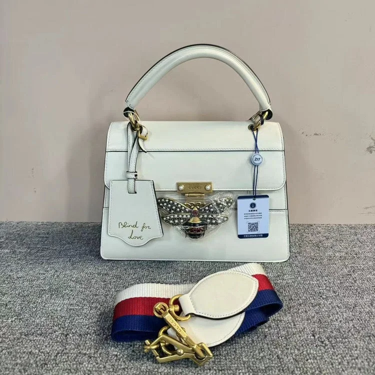 Ladies Gucci shoulder bags with a tassel decorationLadies Gucci shoulder bags with a tassel decorationGucci Bee Bag - White, Medium Size Flap HandBag With Shoulder Strap