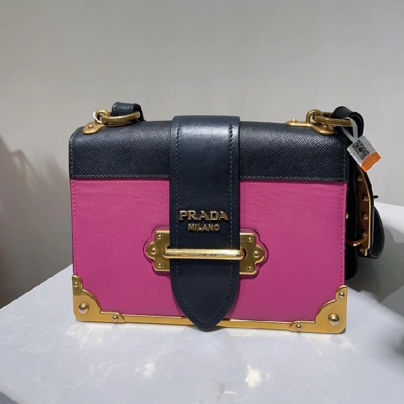 Prada Cleo bags with a contrast - colored interior for visual interestPrada Cahier Pink Black Leather Crossbody Bag Medium