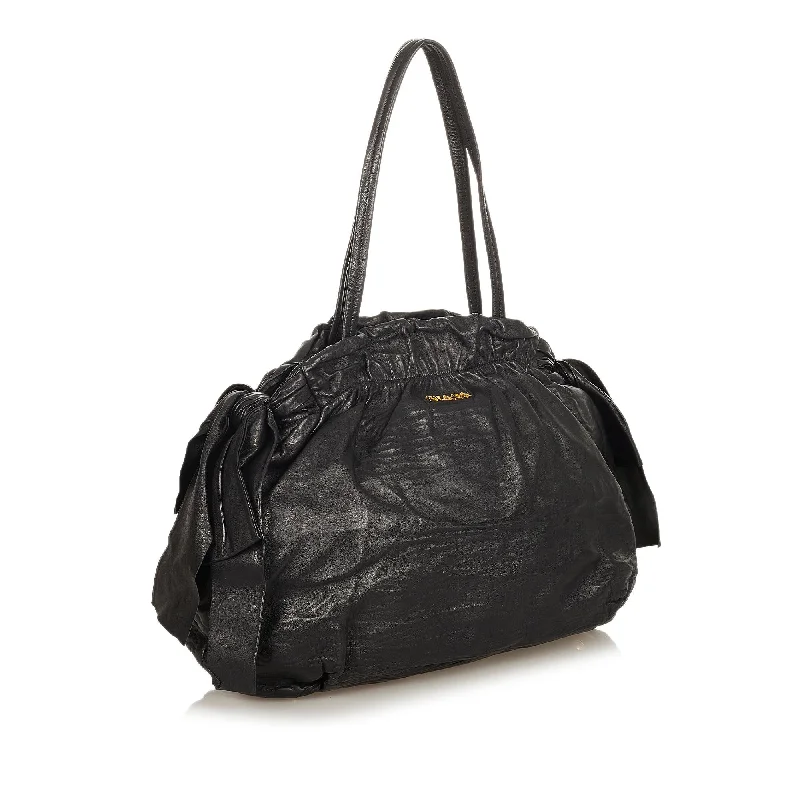 Prada tote bags with a water - resistant coating for outdoor activitiesPrada Bow Leather Satchel 31911