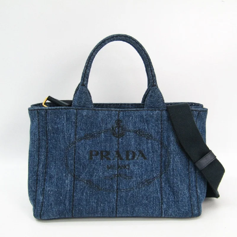 Ladies Prada Galleria bags with a textured leather surface for a more tactile lookPrada Navy Denim Canapa Tote (SHA24073)