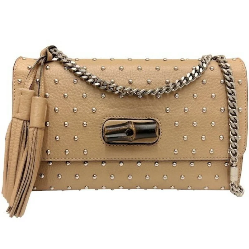 Ladies Gucci handbags with a detachable coin purse insideLadies Gucci handbags with a detachable coin purse insideGucci bamboo studs with fringe chain shoulder Bag ladies pink beige leather 387611