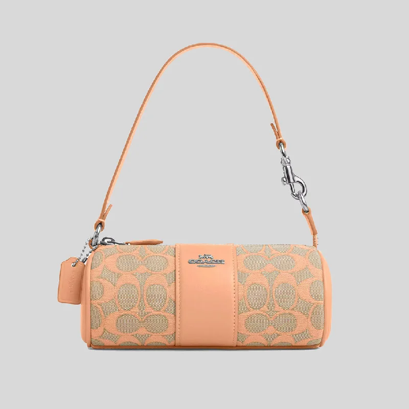 Best bags for weekend getawaysCOACH Nolita Barrel Bag In Signature Jacquard Faded Blush CU003