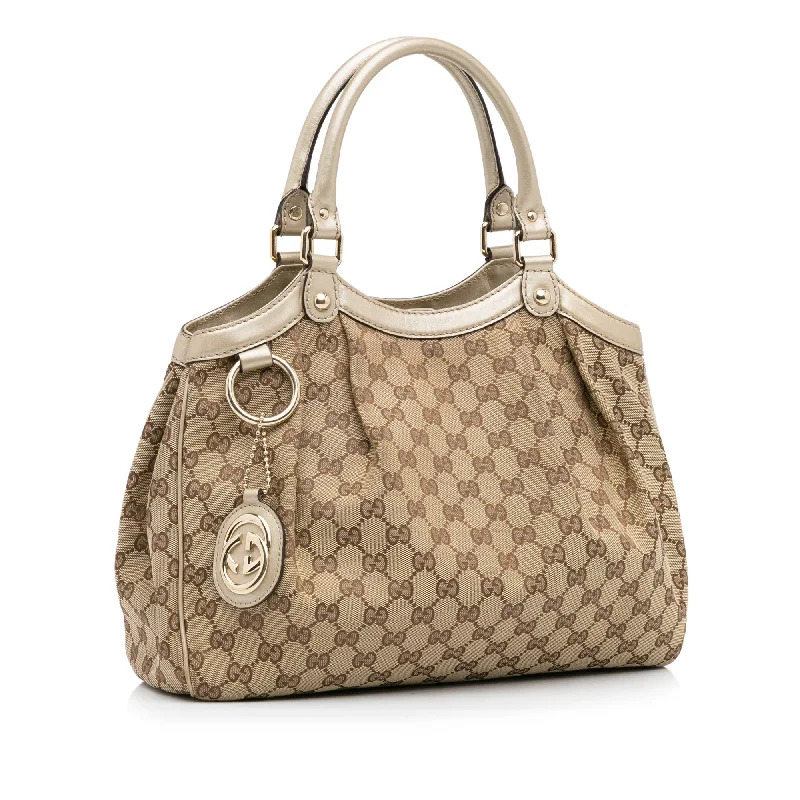 Women Gucci bags with a zippered interior pocketWomen Gucci bags with a zippered interior pocketBrown Gucci GG Canvas Sukey Tote