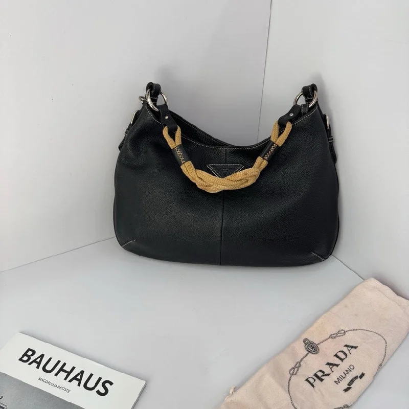 Prada tote bags with a double - handle and shoulder - strap option for easy usePrada Black Cowhide Hobo Bag 39cm