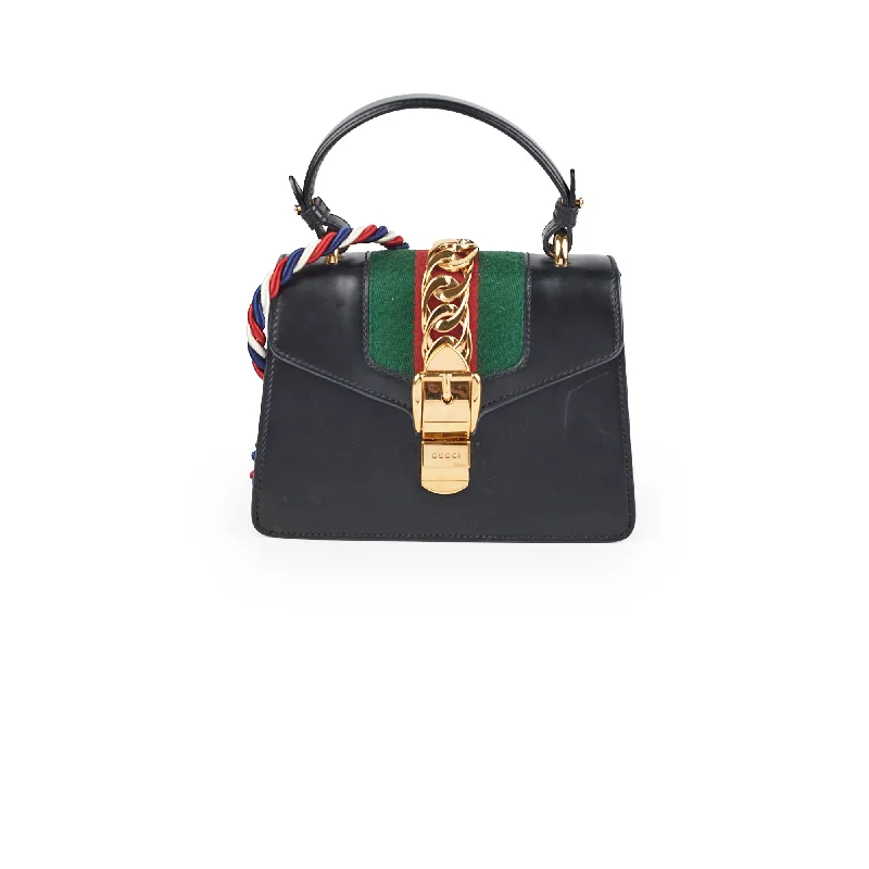 Gucci tote bags for women with a printed Gucci logoGucci tote bags for women with a printed Gucci logoGucci Sylvie Black Top Handle