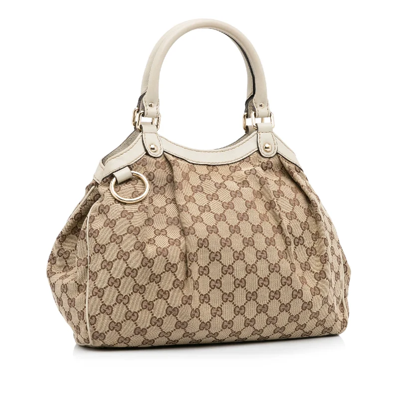 Ladies Gucci Dionysus bags with a star - shaped charmLadies Gucci Dionysus bags with a star - shaped charmTan Gucci GG Canvas Sukey Tote