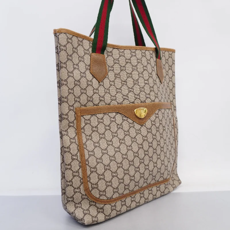 Women Gucci bags with a chain - link trim and a leather bodyWomen Gucci bags with a chain - link trim and a leather bodyGUCCI  Sherry Line 39 02 003 Women's GG Plus,Leather Tote Bag Beige