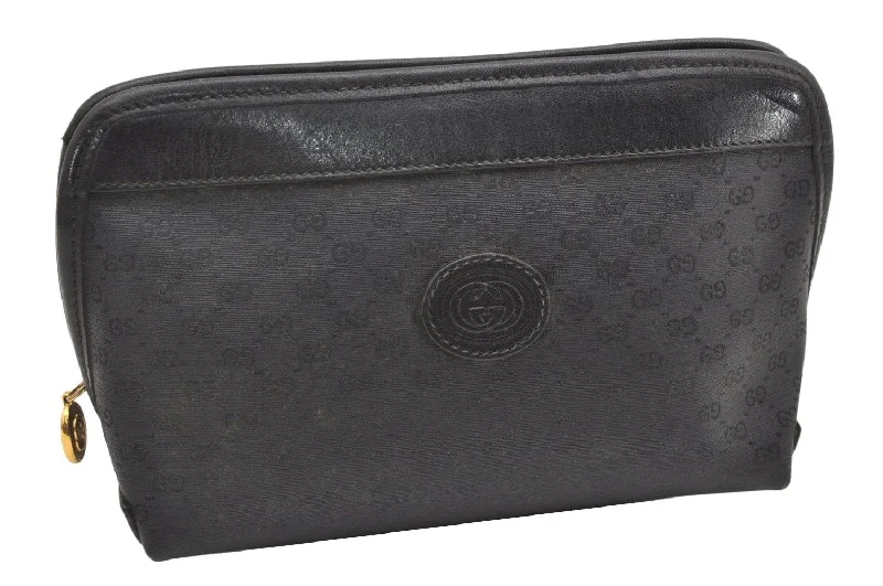 Women Gucci bags with a magnetic snap closure for easy accessWomen Gucci bags with a magnetic snap closure for easy accessAuthentic GUCCI Vintage Micro GG PVC Leather Clutch Hand Bag Purse Black 7230K