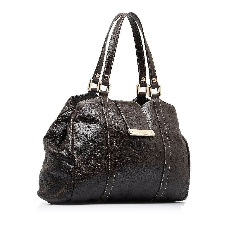 Women Gucci Sylvie bags with a monogram - embossed leatherWomen Gucci Sylvie bags with a monogram - embossed leatherBrown Gucci Guccissima New Ladies Tote