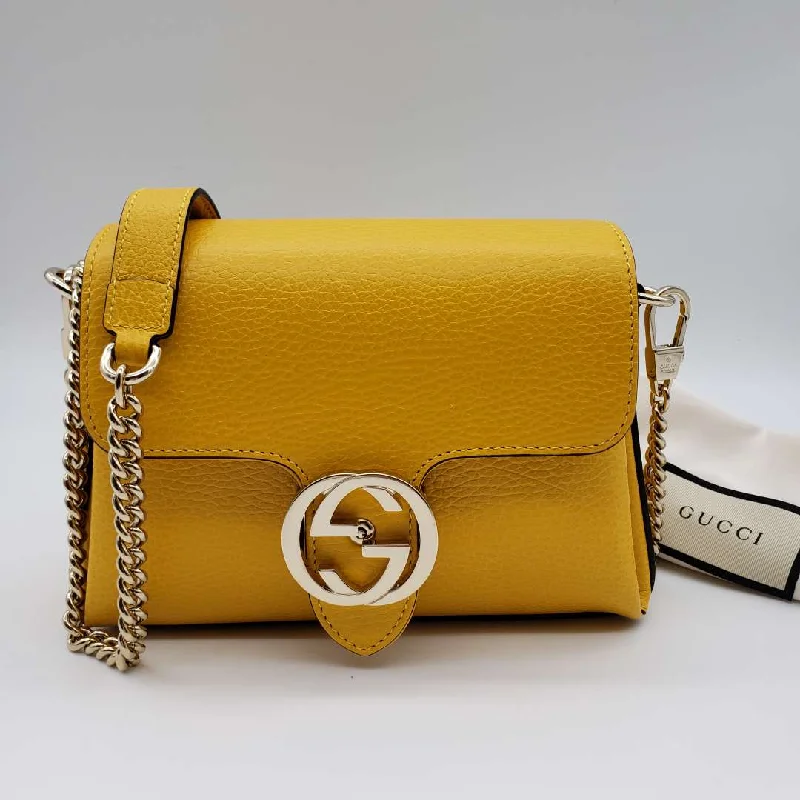 Women Gucci Sylvie bags with a detachable ribbon detailWomen Gucci Sylvie bags with a detachable ribbon detailGucci GG Interlocking Crossbody and Shoulder Bag