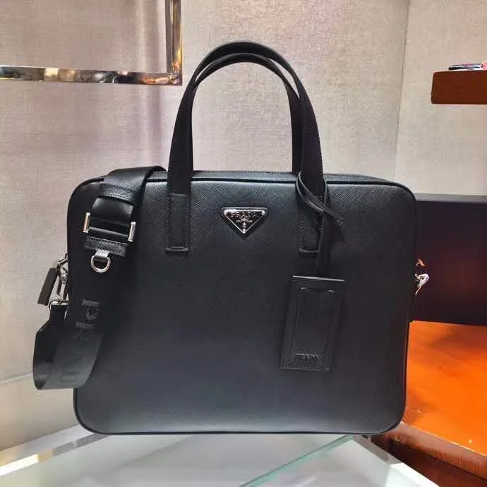 Prada bags with a snap - button closure and a decorative charm for a fashionable lookWhimsy Finds - Prada Bags - 148