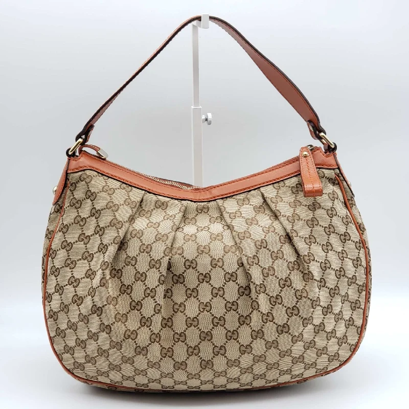 Women Gucci Sylvie bags with a leather - wrapped handleWomen Gucci Sylvie bags with a leather - wrapped handleGucci GG Sukey Shoulder Bag