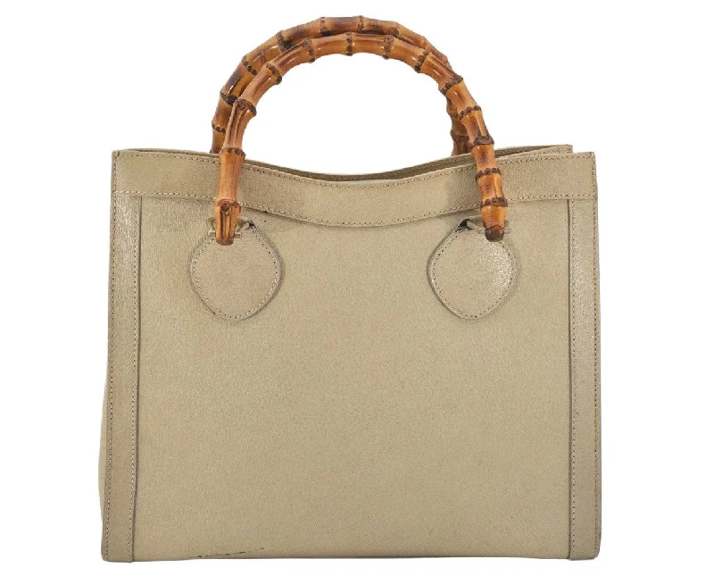 Women Gucci bags with a zippered interior pocketWomen Gucci bags with a zippered interior pocketAuthentic GUCCI Vintage Bamboo Hand Bag Leather 0028260 Cream White 7169K