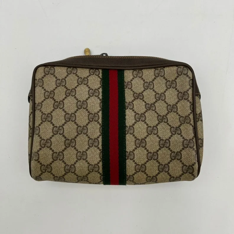 Gucci Marmont bags for women with a snakeskin - effect panelGucci Marmont bags for women with a snakeskin - effect panelGucci Beige GG Canvas Stripe Clutch Wristlet Small Morandi