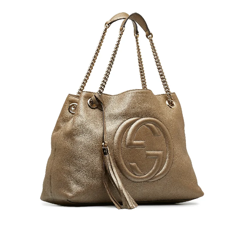 Women Gucci bags with interlocking G hardware for a classic lookWomen Gucci bags with interlocking G hardware for a classic lookGold Gucci Medium Soho Chain Tote