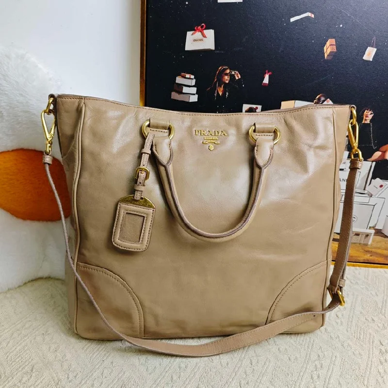 Prada bags with a front - zip pocket for small items like cards and keysPrada Beige Two-Way Leather Tote Bag Medium