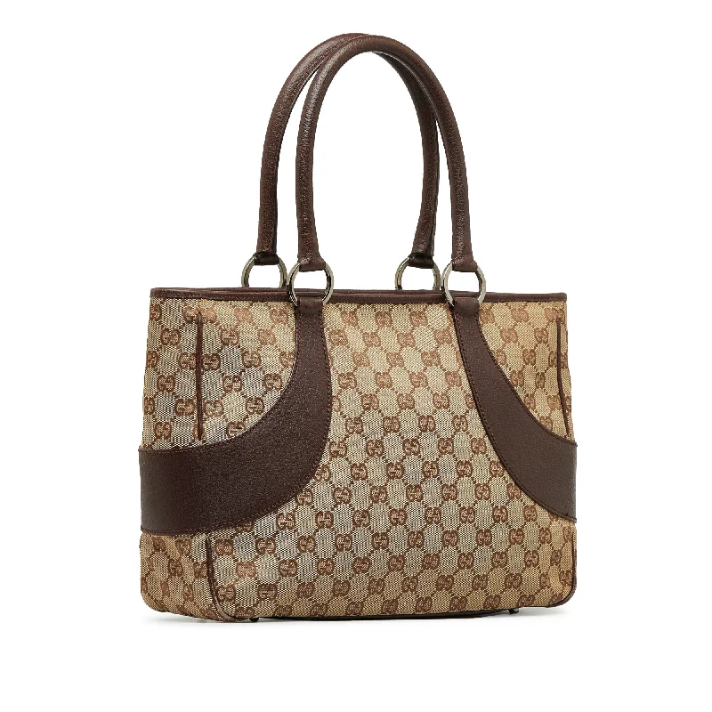 Women Gucci crossbody bags with a woven leather strapWomen Gucci crossbody bags with a woven leather strapBrown Gucci GG Canvas Tote Bag