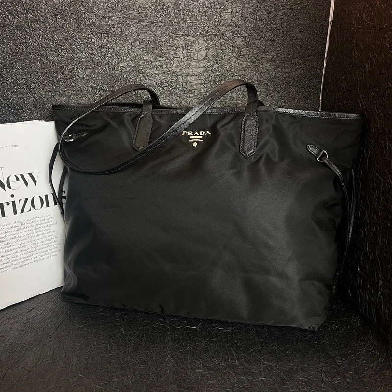 Prada Cleo bags with a crystal - embellished logo for added luxuryPrada Black Nylon Tote Bag 37cm