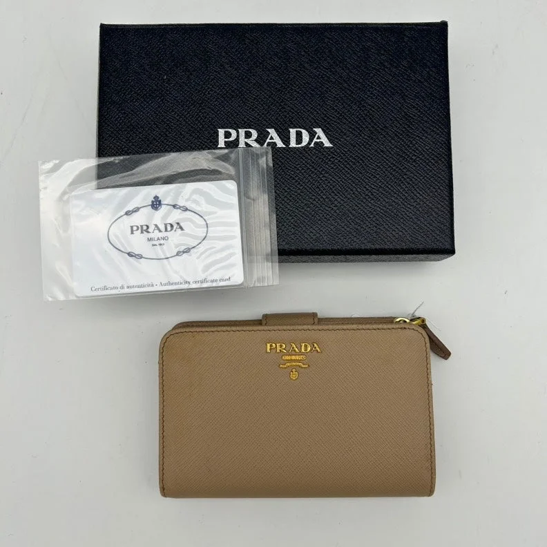 Prada Cleo bags with a detachable coin purse for added functionalityPrada Saffiano Tan Compact Wallet