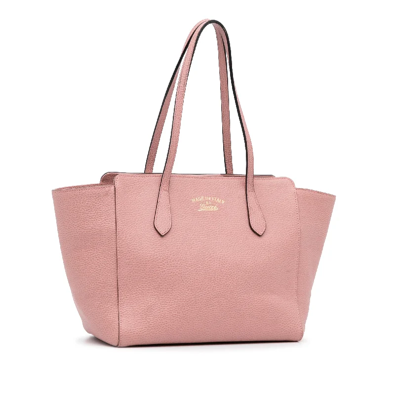 Gucci handbags for women with a patent - leather finishGucci handbags for women with a patent - leather finishPink Gucci Small Swing Tote Bag