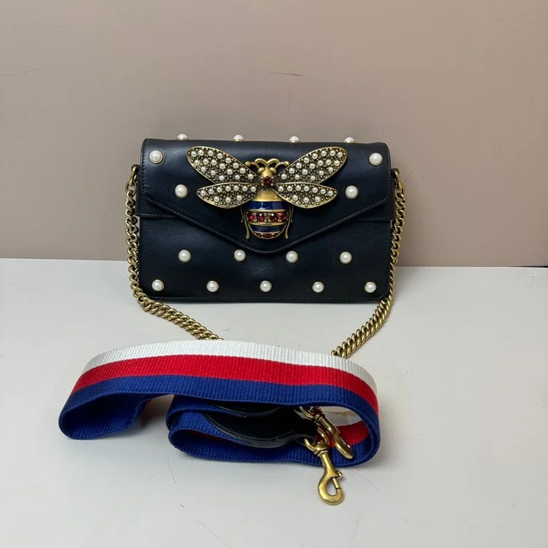 Women Gucci crossbody bags in a bold red colorWomen Gucci crossbody bags in a bold red colorGucci Bee Pearl 2way Black Leather Bag Small with Gold Chain and Striped Strap