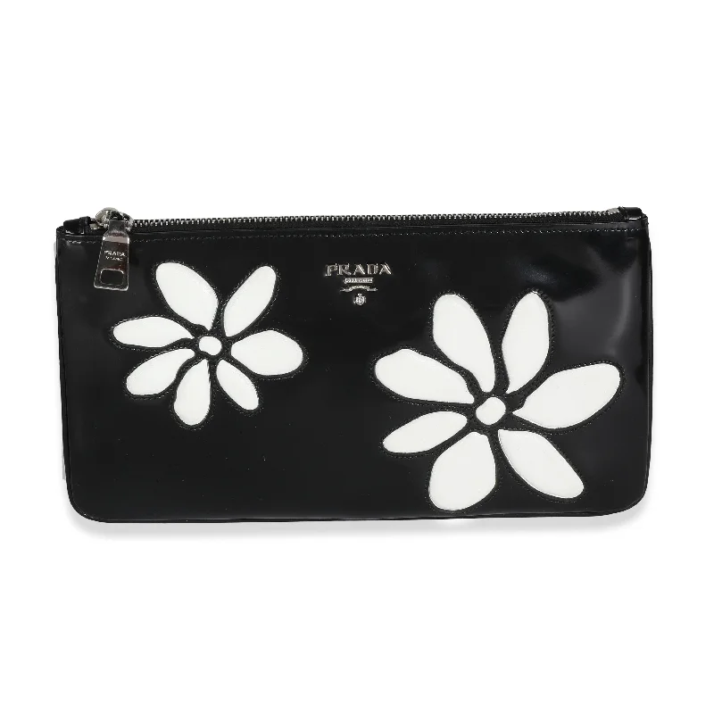 Ladies Prada handbags with a detachable wallet inside for added conveniencePRADA Black Spazzolato Flower Zip Pouch