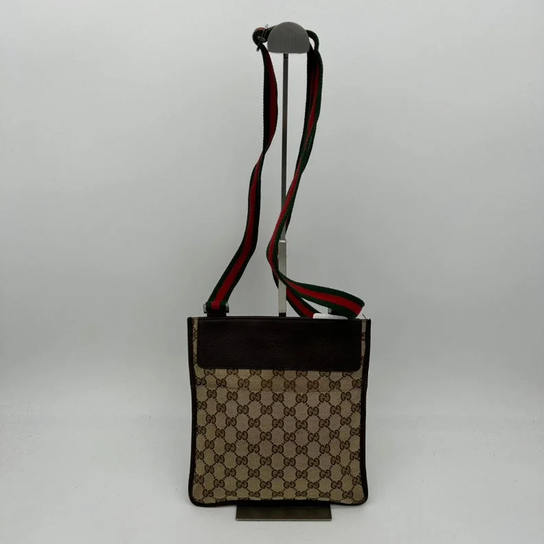 Women Gucci bags with a snap - button closure and a decorative charmWomen Gucci bags with a snap - button closure and a decorative charmGucci Beige Brown Canvas Leather Crossbody Bag Medium