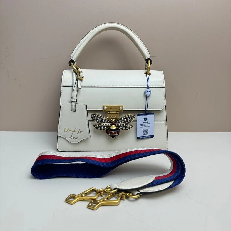 Women Gucci Sylvie bags with a detachable ribbon detailWomen Gucci Sylvie bags with a detachable ribbon detailGucci Bee Leather 2way Bag - White Medium with Embellished Bee Detail and Optional Strap