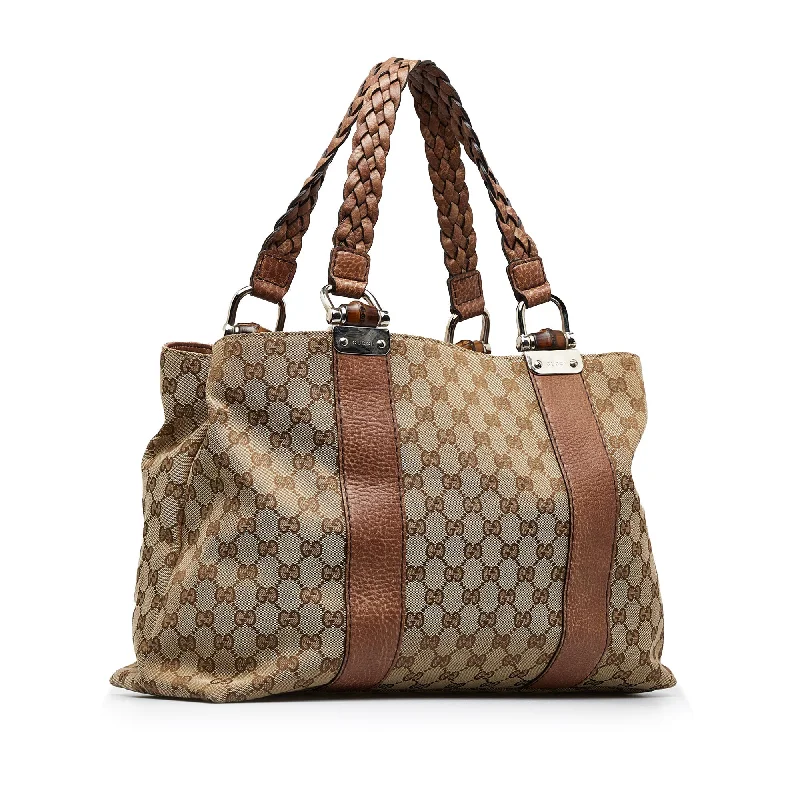 Gucci handbags for women with a metal - framed claspGucci handbags for women with a metal - framed claspTan Gucci Medium GG Canvas Bamboo Bar Tote