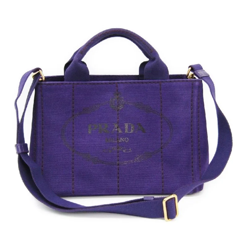 Prada Cahier bags with a leather - wrapped handle for a luxurious feelPrada Purple Denim Canapa Tote  (SHA-10321)