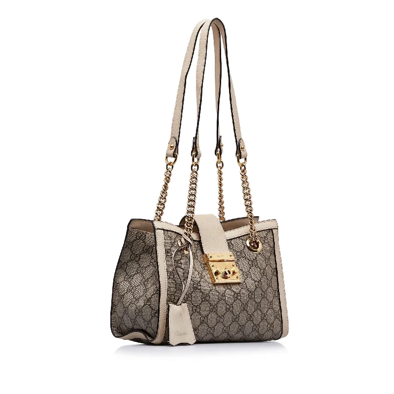 Women Gucci Sylvie bags with a detachable ribbon detailWomen Gucci Sylvie bags with a detachable ribbon detailBrown Gucci Small GG Supreme Padlock Tote