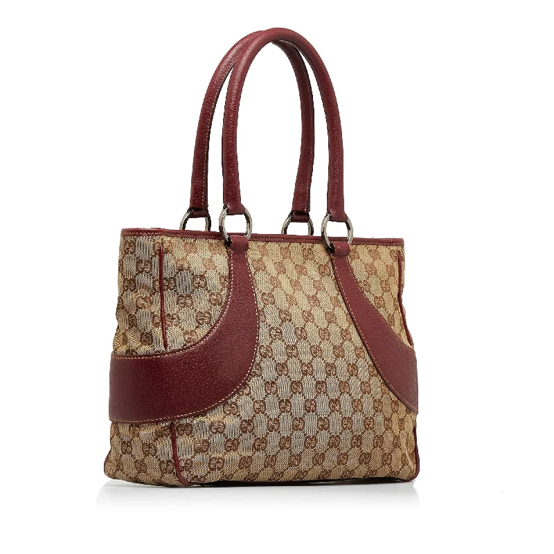 Women Gucci bags with interlocking G hardware for a classic lookWomen Gucci bags with interlocking G hardware for a classic lookTan Gucci GG Canvas Tote Bag