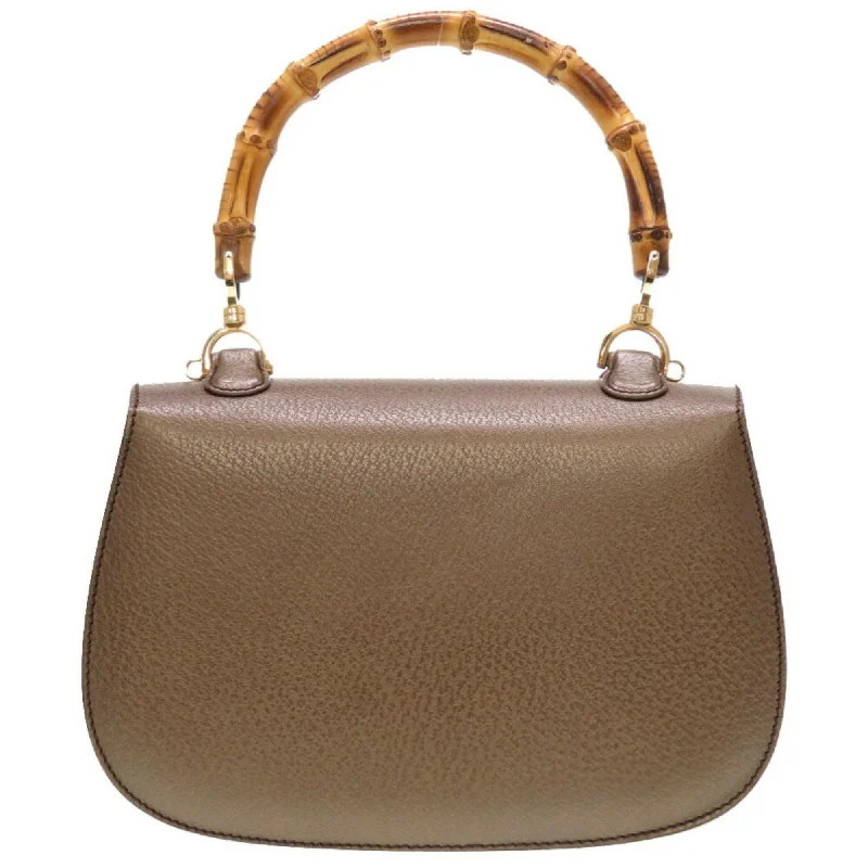 Gucci Marmont bags for women with a contrast - colored interiorGucci Marmont bags for women with a contrast - colored interiorGucci bamboo leather bronze