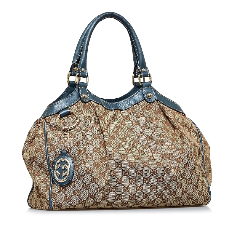 Women Gucci crossbody bags with a woven leather strapWomen Gucci crossbody bags with a woven leather strapBrown Gucci GG Canvas Sukey Tote Bag