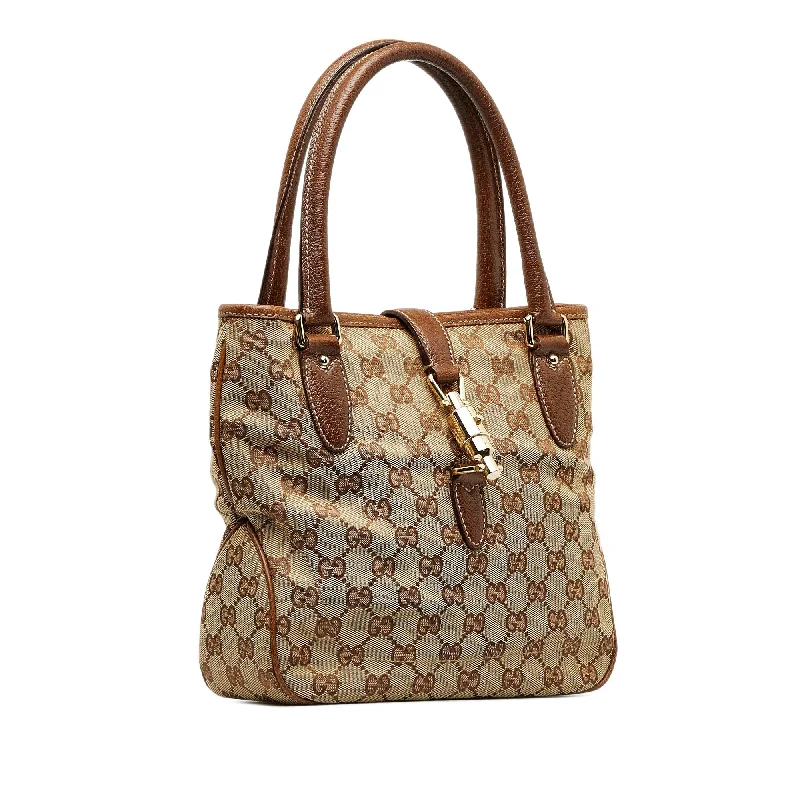 Gucci Marmont bags for women with gold - toned hardwareGucci Marmont bags for women with gold - toned hardwareTan Gucci GG Canvas Jackie Piston Lock Tote Bag