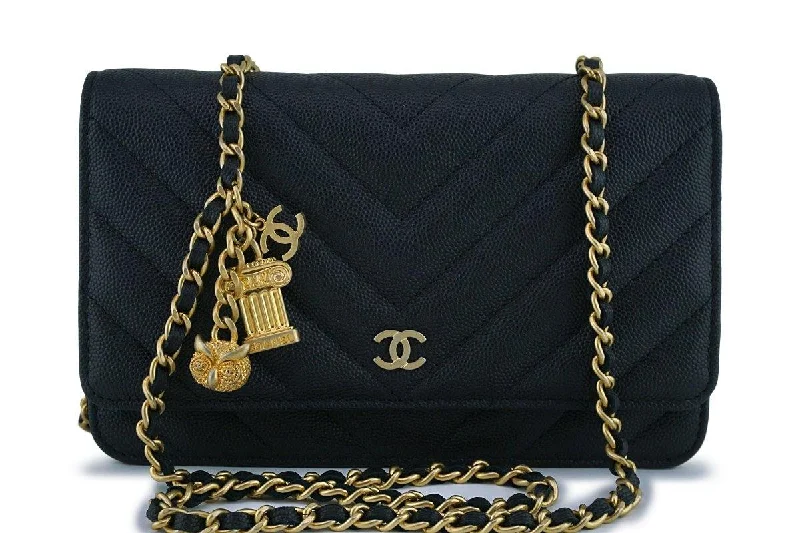 Chanel bags for women with minimalist styleNew Chanel Black Caviar Chevron Charms WOC Wallet on Chain Flap Bag