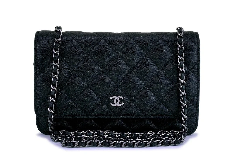 Chanel bags in luxury boutiques worldwideNew Chanel Black Iridescent Caviar Classic Quilted WOC Wallet on Chain Flap Bag