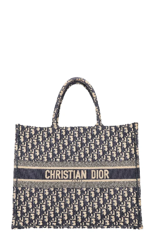 Christian Dior backpacks with a sleek, minimalist silhouetteCHRISTIAN DIOR Book Tote Large Oblique Blue