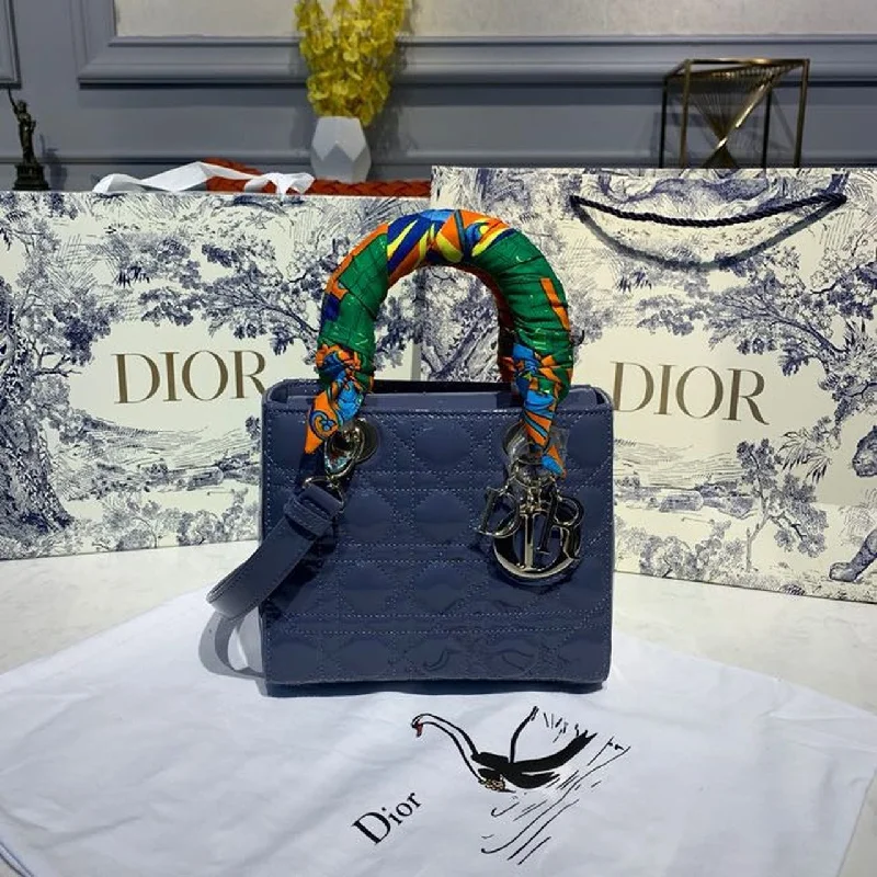 Christian Dior Saddle bags with a studded trim for a bold lookChristian Dior Small Lady Bag Silver Hardware Deep Blue Patent