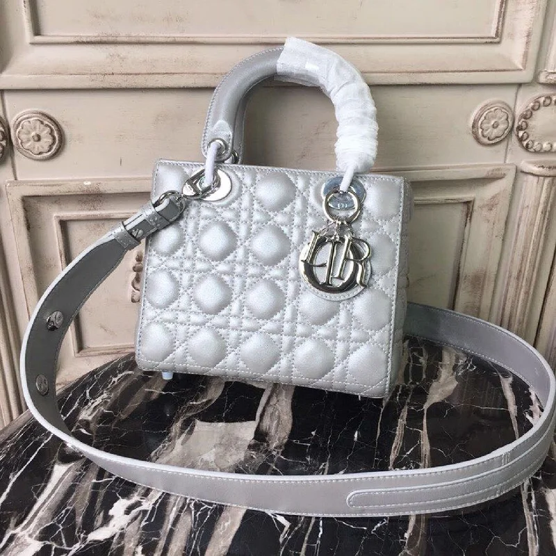 Christian Dior Saddle bags with a studded trim for a bold lookChristian Dior Small Opaline Gray Pearlescent Cannage Lady Bag