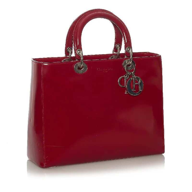 Christian Dior handbags with a snap - button closure and a decorative buckleDior Lady Dior Leather Handbag (SHG-31142)