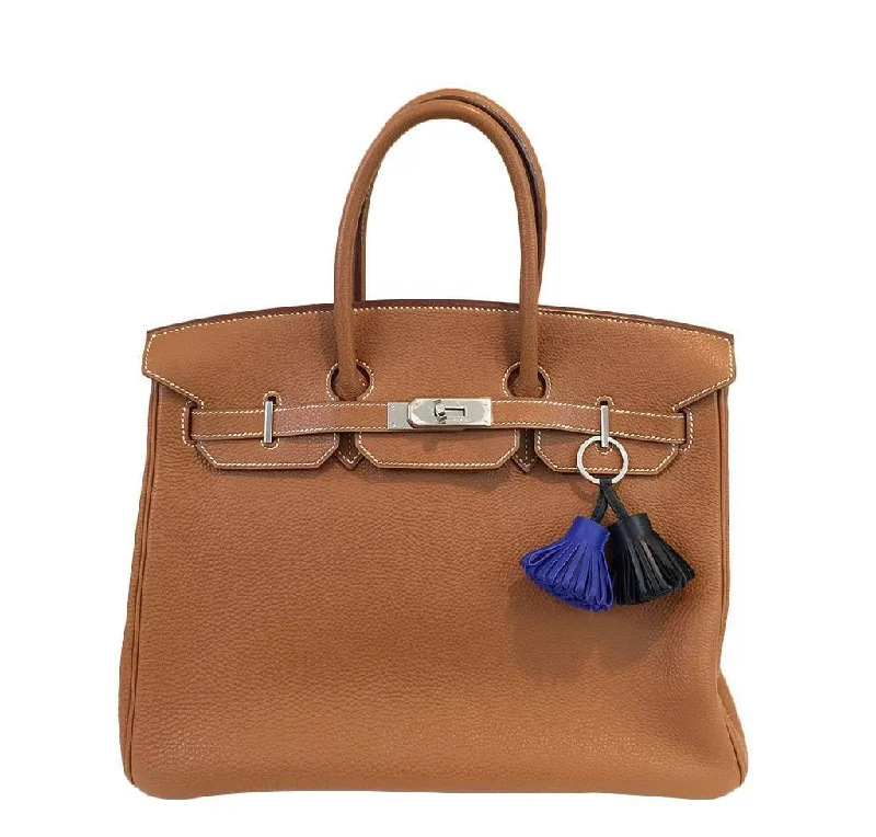 Hermes Birkin Bags with a Woven Leather Strap DetailHermès Birkin 35 Gold Clemence PHW