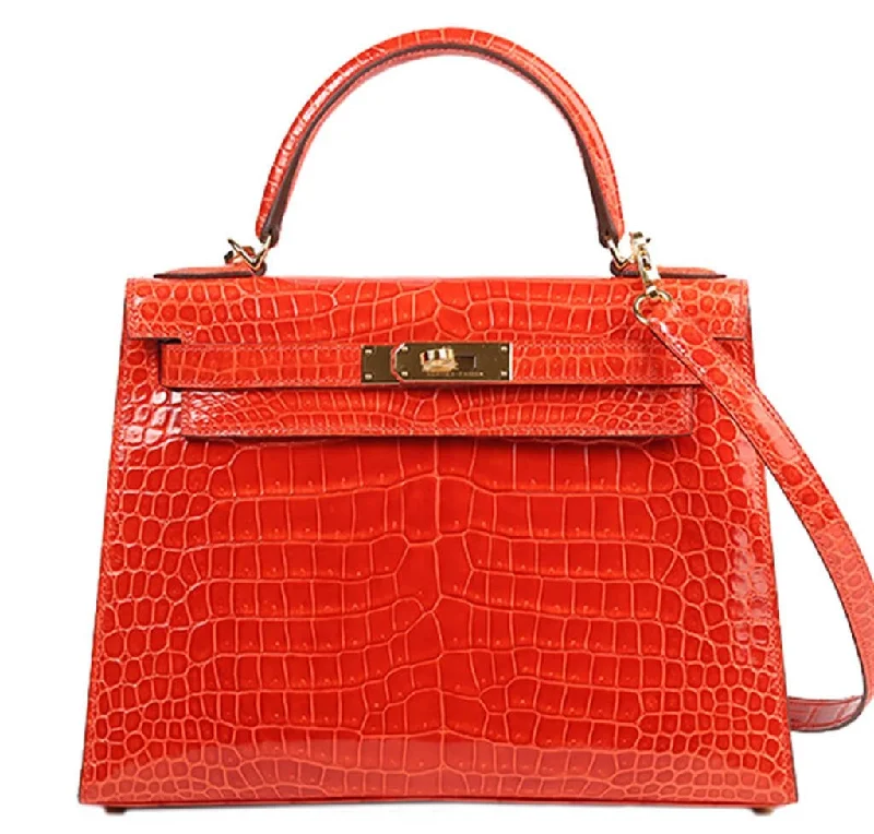 Hermès Kelly Bags in a deep indigo blue for a classic and sophisticated lookHermès Porosus Crocodile Kelly 28 Geranium