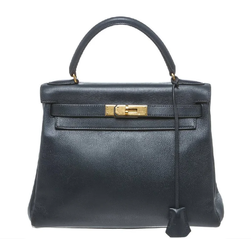 Hermès Kelly Bags with a chain - embellished handle for a modern twistHermès Kelly 28 Navy Blue Epsom Leather Bag GHW